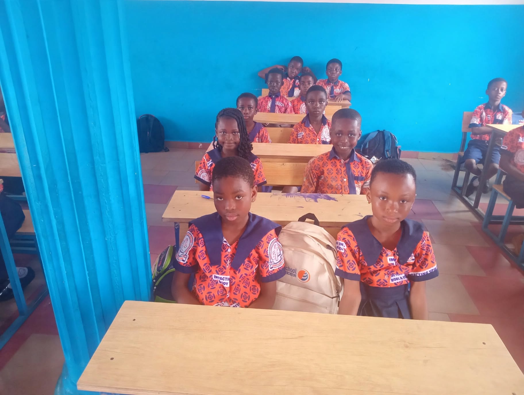 Pupils focus on their work during a classroom lesson